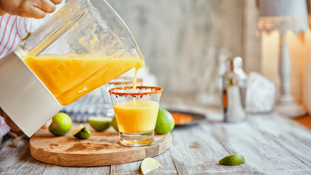 high speed blender preparing mango chili lime sorbet
