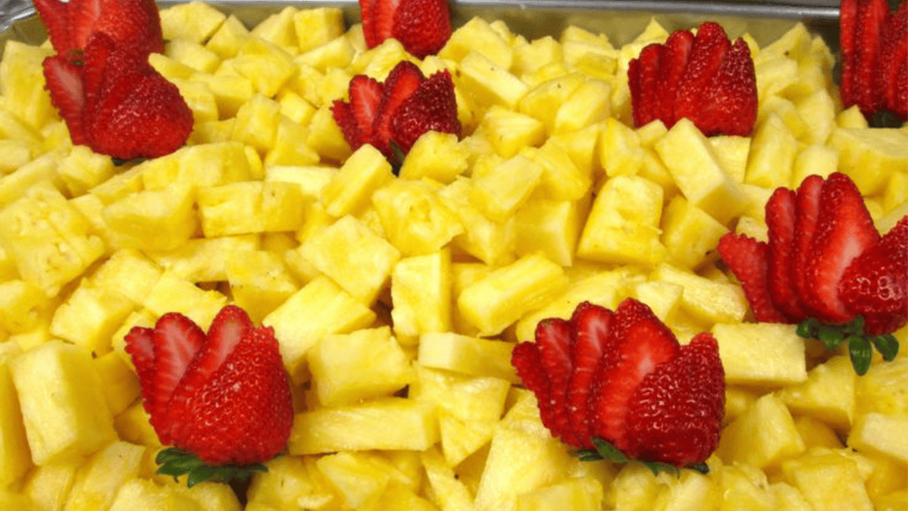 Fresh strawberries and pineapple chunks