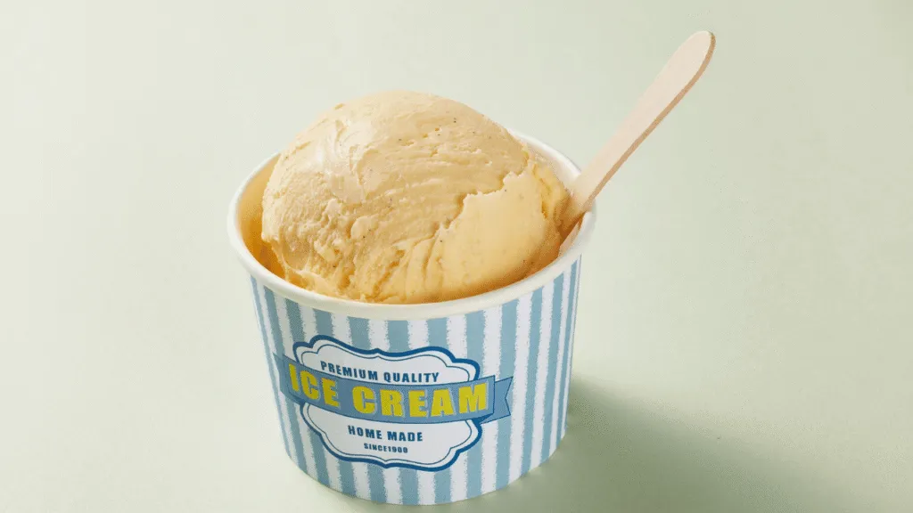 A well-lit studio shot showcasing an assortment of Breyers non-dairy ice cream pints. In the foreground, the pints are arranged neatly, displaying their diverse flavors such as Chocolate, Vanilla, and Strawberry. The middle ground features a clean, minimalist backdrop, allowing the products to take center stage. Soft, even lighting from above creates a warm, inviting atmosphere, highlighting the rich, creamy texture of the non-dairy frozen treats. The overall composition emphasizes the health-conscious and dairy-free nature of these Breyers alternatives, making them an appealing choice for the "Special Dietary Options" section. Pint of Breyers Ice Cream Special Dietary Options