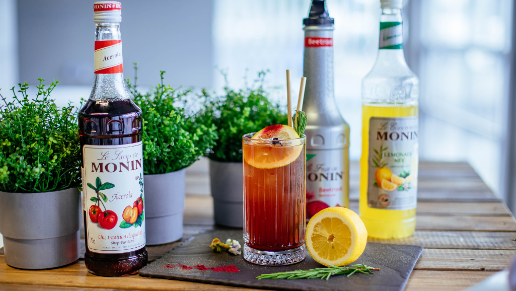 A vibrant arrangement of stevia-based simple syrups in various flavors, presented on a rustic wooden surface. In the foreground, clear glass bottles filled with golden, amber, and emerald-hued liquids, each label indicating a unique flavor profile - vanilla, cinnamon, mint, and berry. The middle ground features a scatter of fresh herbs, citrus slices, and edible flowers, hinting at the natural, botanical inspiration behind these healthful syrups. Warm, diffused lighting casts a soft, inviting glow, while the background maintains a sense of simplicity and authenticity, allowing the star ingredients to shine. This image evokes a feeling of homemade, artisanal indulgence, perfect for the "Flavor Variations for Your Stevia Simple Syrup" section.