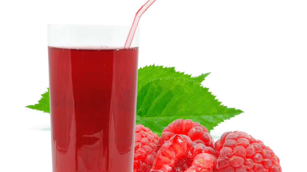 A stainless steel mesh strainer sitting on a wooden kitchen counter, filled with freshly harvested raspberries. The strainer is held in place by a pair of sturdy wooden handles, allowing for easy separation of the juice from the fruit. Soft, natural lighting filters in through a nearby window, casting a warm, inviting glow on the scene. The raspberries, in varying shades of deep red and purple, contrast beautifully against the silver of the strainer. The overall composition evokes a sense of simplicity, purity, and the joy of homemade, artisanal food preparation. Step-by-Step Raspberry Juice Recipe