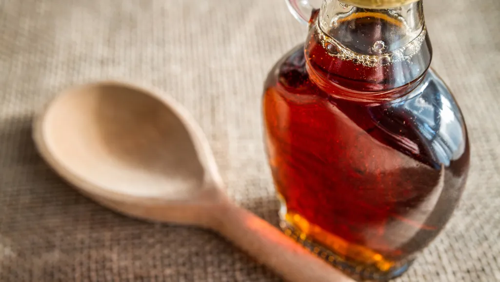 A crystal clear glass jar filled with a vibrant emerald green stevia simple syrup, glistening under a warm, soft lighting. The syrup's surface reflects a natural, rustic wooden table in the background, hinting at its potential culinary applications. Delicate steam rises from the jar, suggesting the syrup's freshness. The overall scene evokes a sense of purity, simplicity and versatility, perfectly complementing the "Creative Culinary Uses Beyond Drinks" section of the article. A crystal clear glass jar filled with a vibrant emerald green stevia simple syrup, glistening under a warm, soft lighting. The syrup's surface reflects a natural, rustic wooden table in the background, hinting at its potential culinary applications. Delicate steam rises from the jar, suggesting the syrup's freshness. The overall scene evokes a sense of purity, simplicity and versatility, perfectly complementing the "Creative Culinary Uses Beyond Drinks" section of the article.