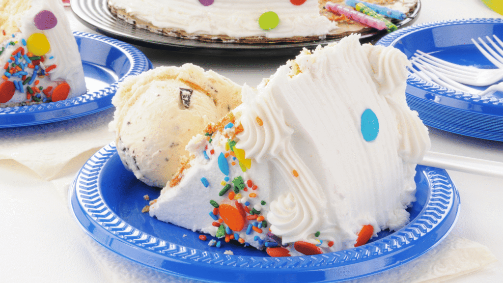 A step-by-step recipe for delectable cake batter ice cream, presented against a soft, pastel-colored backdrop. In the foreground, an array of classic ice cream-making tools - a large mixing bowl, a wooden spoon, and a metal ice cream scoop. Carefully arranged in the middle ground, the key ingredients: vanilla extract, heavy cream, sugar, and cake batter. The background features a subtle pattern reminiscent of a vintage recipe card, adding a touch of nostalgia. Warm, diffused lighting casts a gentle glow, creating a cozy, inviting atmosphere. The overall composition emphasizes the handcrafted, homemade nature of this decadent frozen treat. Step-by-Step Cake Batter Ice Cream Recipe