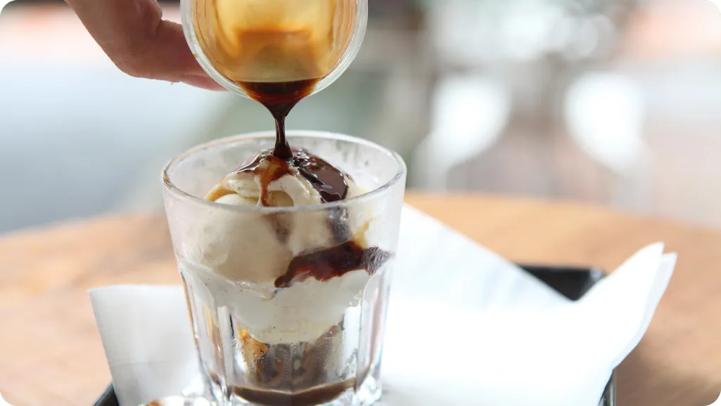 A vibrant, dynamic illustration of various Ninja Creami flavor combinations. In the foreground, an array of fresh fruits, berries, and creamy scoops in bold, enticing colors. The middle ground features the Ninja Creami machine itself, rendered in sleek, high-tech detail, surrounded by playful splashes of vibrant hues. The background showcases a softly blurred kitchen setting, with hints of stainless steel appliances and modern, minimalist decor to emphasize the easy, effortless nature of these Ninja Creami recipes. Dramatic, directional lighting casts warm, inviting shadows, creating depth and dimension. The overall mood is one of culinary delight, innovation, and accessible sophistication. A vibrant, dynamic illustration of various Ninja Creami flavor combinations. In the foreground, an array of fresh fruits, berries, and creamy scoops in bold, enticing colors. The middle ground features the Ninja Creami machine itself, rendered in sleek, high-tech detail, surrounded by playful splashes of vibrant hues. The background showcases a softly blurred kitchen setting, with hints of stainless steel appliances and modern, minimalist decor to emphasize the easy, effortless nature of these Ninja Creami recipes. Dramatic, directional lighting casts warm, inviting shadows, creating depth and dimension. The overall mood is one of culinary delight, innovation, and accessible sophistication.