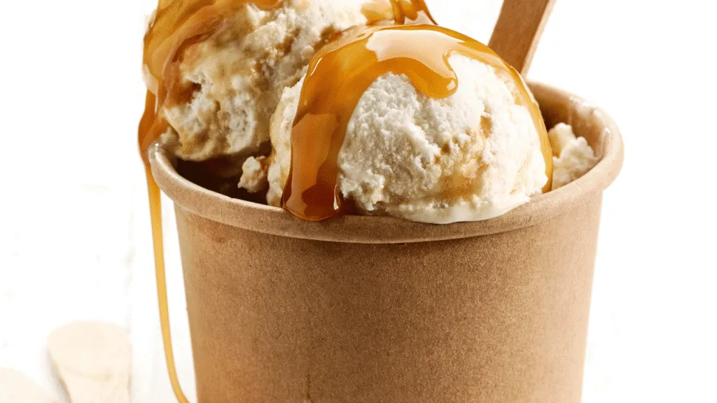 A vibrant still life featuring an assortment of delectable ingredients for a Baileys and ice cream recipe. In the foreground, a scoop of rich, creamy ice cream sits atop a waffle cone, drizzled with a decadent Baileys liqueur. Surrounding it, an array of tempting elements - a bottle of Baileys, fresh berries, chocolate shavings, and a sprig of mint. The middle ground showcases a smooth wooden surface, while the background blurs into a warm, softly lit ambiance, evoking a cozy, indulgent atmosphere. Lit by natural, diffuse lighting, the scene exudes a tempting, mouth-watering appeal, inviting the viewer to imagine the delicious treat. Ingredients You’ll Need for the Creamiest Results